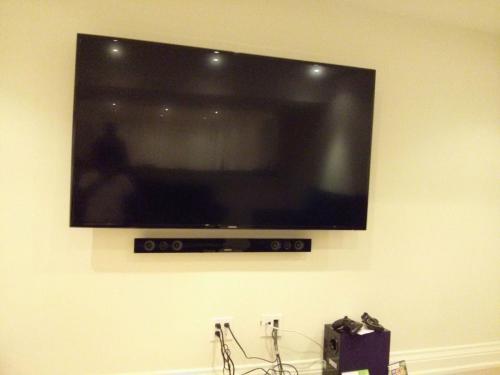 TV Wall Mounting with Soundbar Installation