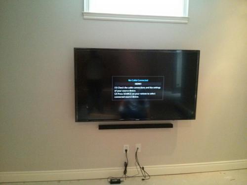 TV Wall Mounting with Soundbar Installation