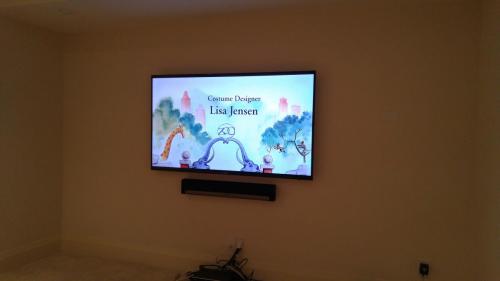 TV Wall Mounting with Soundbar Installation