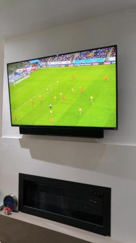 TV Wall Mounting with Soundbar Installation 