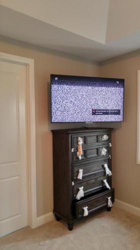 TV Wall Mounting with In-Wall Cord Concealing