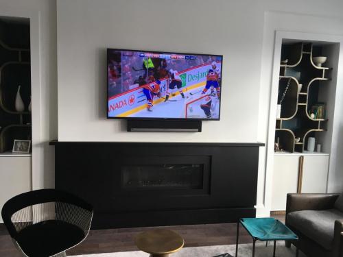 TV Wall Mounting with Soundbar Installation