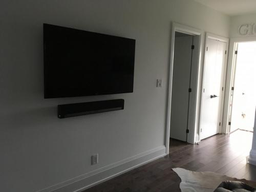 TV Wall Mounting with Soundbar Installation