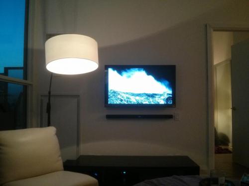 TV Wall Mounting with Soundbar Installation