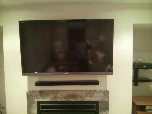 TV Wall Mounting with Soundbar Installation