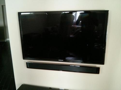 TV Wall Mounting with Soundbar Installation