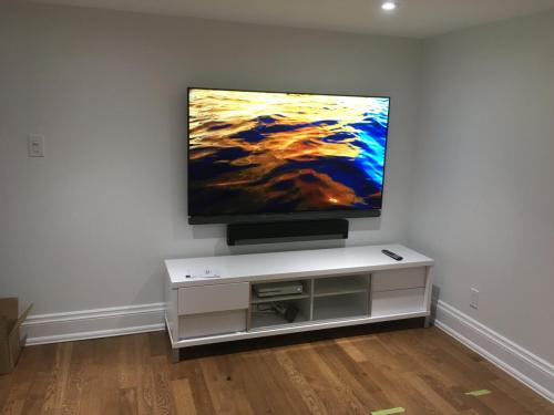 TV Wall Mounting with Soundbar Installation