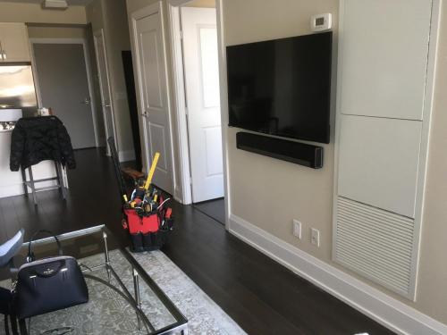 TV Wall Mounting with Soundbar Installation