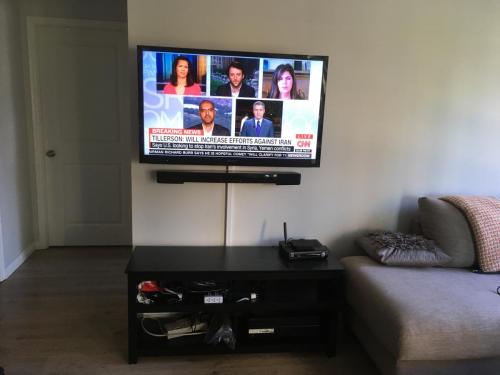 TV Wall Mounting with Soundbar Installation